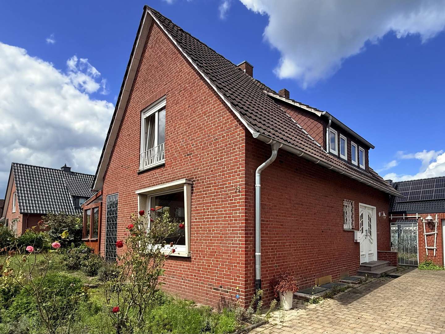Vorder- und Seitenansicht Vorder- und Seitenansicht - Einfamilienhaus in 48429 Rheine mit 98m² kaufen