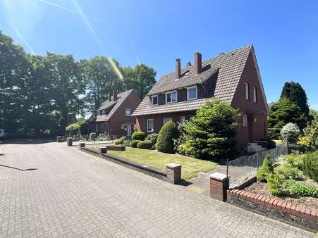 Seitenansicht - Zweifamilienhaus in 48429 Rheine mit 130m² kaufen