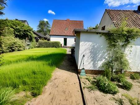 Rückansicht und Garten Rückansicht und Garten - Einfamilienhaus in 48432 Rheine mit 92m² kaufen