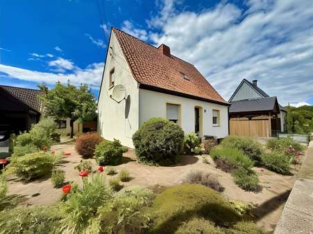 Vorder- und Seitenansicht Vorder- und Seitenansicht - Einfamilienhaus in 48432 Rheine mit 92m² kaufen
