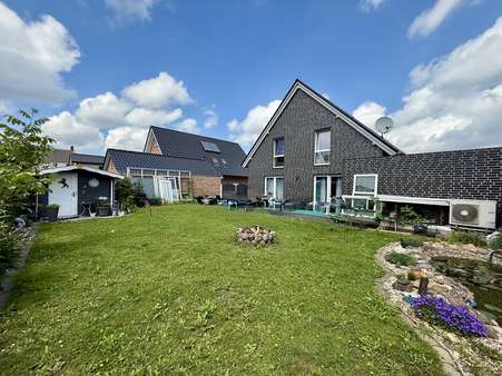 Rückansicht und Garten - Einfamilienhaus in 48599 Gronau mit 133m² kaufen
