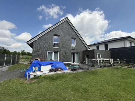 Rückansicht und Garten - Einfamilienhaus in 48599 Gronau mit 133m² kaufen