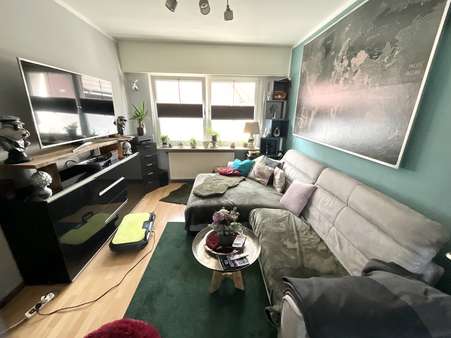 Wohnzimmer Wohnzimmer - Zweifamilienhaus in 48429 Rheine mit 243m² kaufen