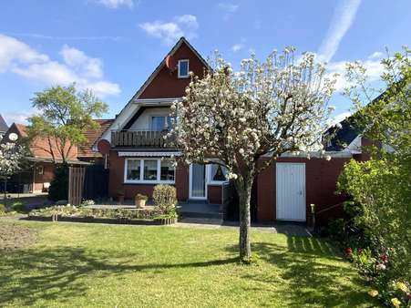 Rückansicht mit Garten - Zweifamilienhaus in 48431 Rheine mit 174m² günstig kaufen