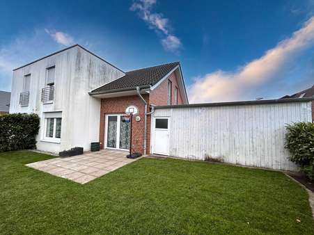 Rückwärtige Gartenansicht - Doppelhaushälfte in 48282 Emsdetten mit 97m² kaufen
