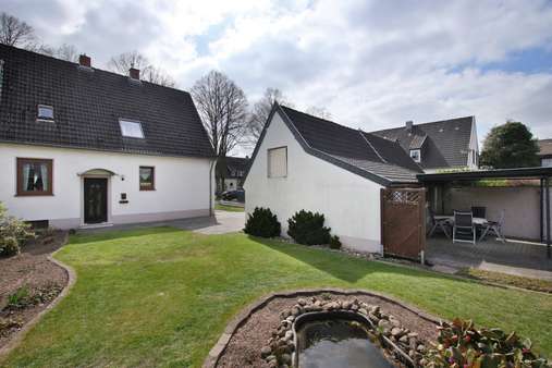 Gartenansicht - Doppelhaushälfte in 49504 Lotte mit 95m² kaufen