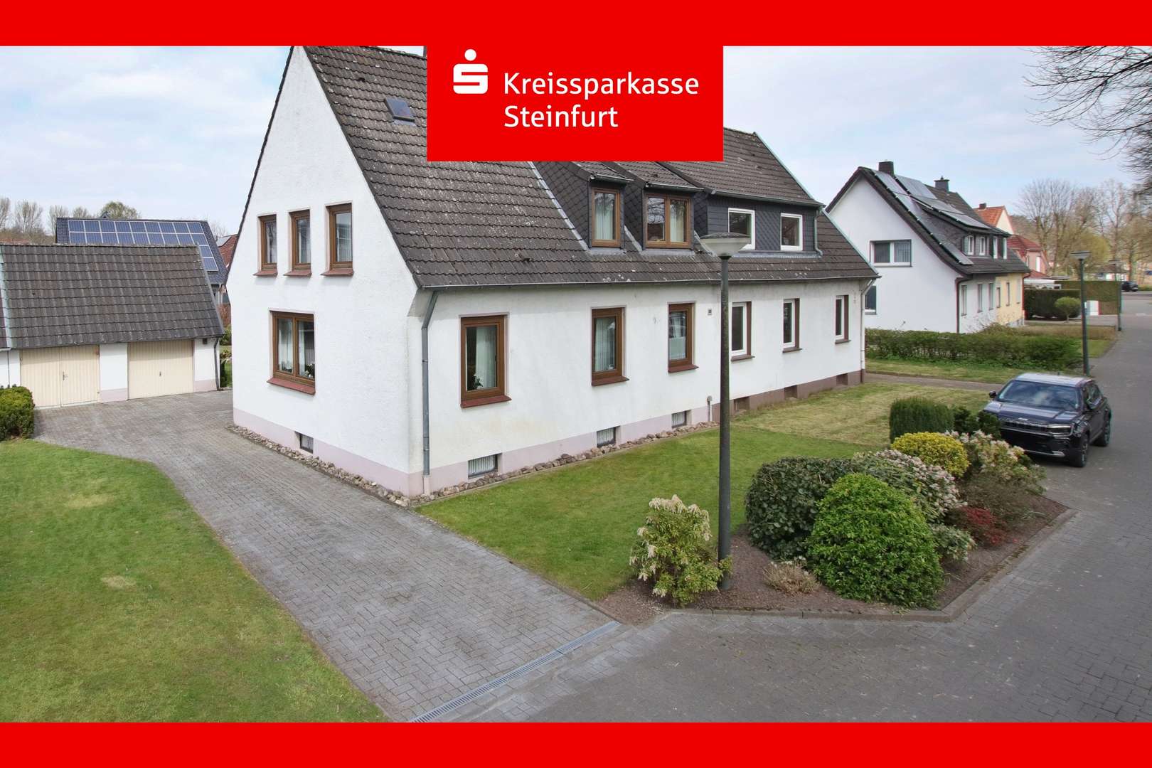 Straßenansicht - Doppelhaushälfte in 49504 Lotte mit 95m² kaufen