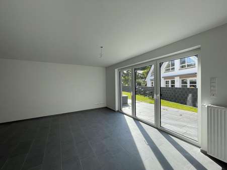 Wohnzimmer mit Terrassenzugang Wohnzimmer mit Terrassenzugang - Reihenendhaus in 49497 Mettingen mit 124m² kaufen