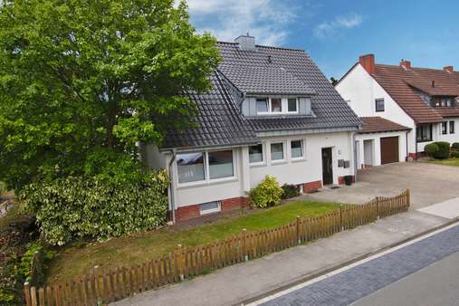 Straßenansicht links Straßenansicht links - Zweifamilienhaus in 48607 Ochtrup mit 156m² als Kapitalanlage kaufen