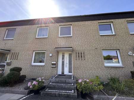 Östliche Frontansicht - Reihenmittelhaus in 48282 Emsdetten mit 98m² kaufen