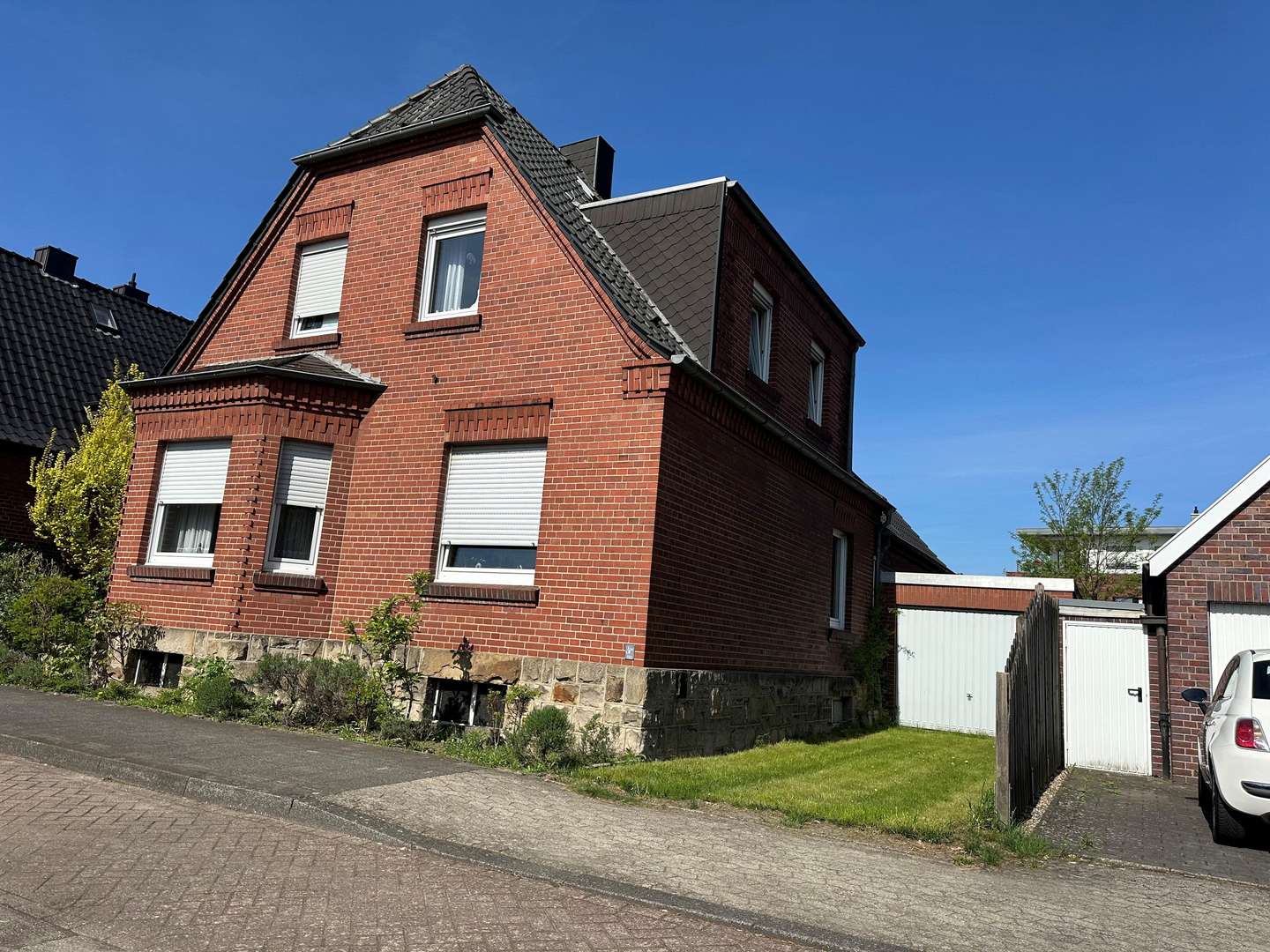Straßenansicht mit Garage - Einfamilienhaus in 48431 Rheine mit 116m² kaufen