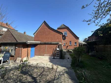 Terrasse und Zugang Garage/Werkstatt - Einfamilienhaus in 48431 Rheine mit 116m² kaufen