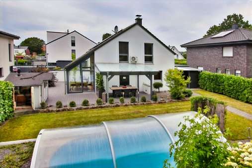 Gartenansicht Gartenansicht - Einfamilienhaus in 48432 Rheine mit 120m² kaufen