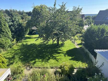 Blick in den Garten - Einfamilienhaus in 49477 Ibbenbüren mit 165m² kaufen