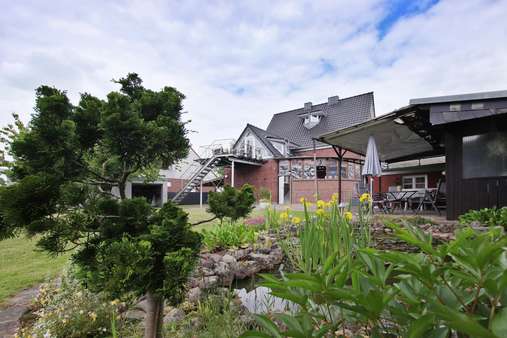 Rückansicht - Zweifamilienhaus in 48366 Laer mit 188m² kaufen