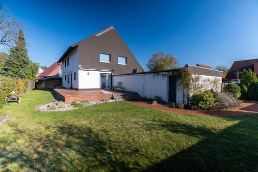 Gartenansicht - Zweifamilienhaus in 48268 Greven mit 174m² kaufen