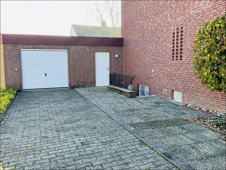Garage und Durchgang zum Garten - Einfamilienhaus in 59071 Hamm mit 135m² kaufen