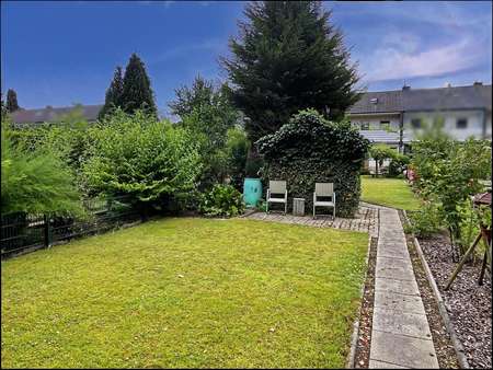 Das große Gartengrundstück ist liebevoll angelegt - Einfamilienhaus in 59063 Hamm mit 98m² kaufen