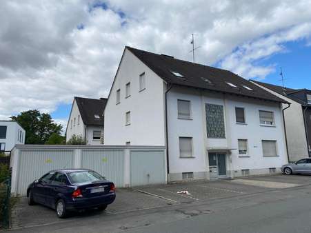 Haus 1 mit 1 Garage und PKW-Stellplätzen / Straßenansicht - Mehrfamilienhaus in 59494 Soest mit 798m² kaufen