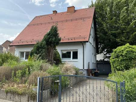 Vorder-/Seitenansicht Vorder-/Seitenansicht - Einfamilienhaus in 59457 Werl mit 143m² kaufen