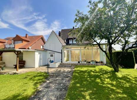 Rückansicht der Immobilie - Zweifamilienhaus in 59597 Erwitte mit 116m² kaufen