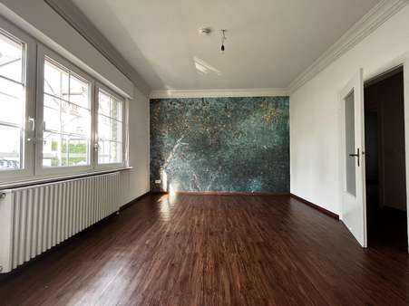 Wohnzimmer - Erdgeschosswohnung in 59555 Lippstadt mit 100m² kaufen