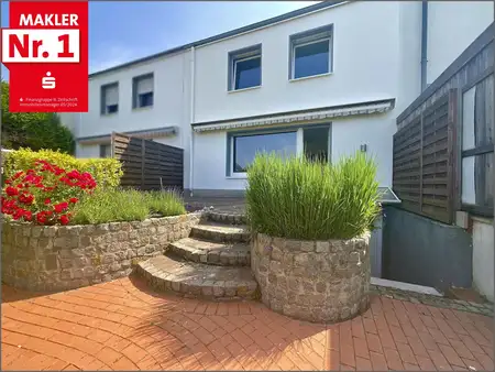 Platz für Ihre Familie: Reihenmittelhaus mit schönem Garten und Garage in Lippstadt-Süd