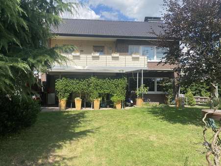 Gartenansicht - Zweifamilienhaus in 59510 Lippetal mit 240m² kaufen