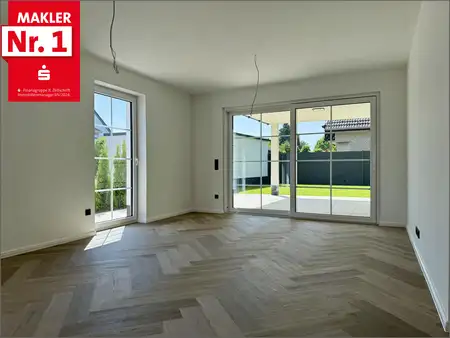 Schöner Wohnen in Bad Waldliesborn: Tolle Neubauwohnung mit Gartenanteil in elegantem Wohnhaus