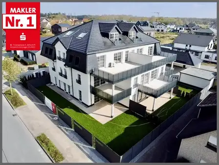 Schöner Wohnen in Bad Waldliesborn: Tolle Neubauwohnung mit großem Balkon und Carport 