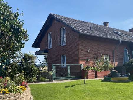 Gartenansicht - Doppelhaushälfte in 59494 Soest mit 154m² kaufen