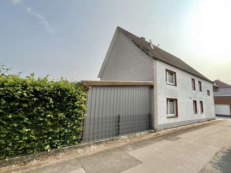 Rückansicht der Immobilie - Einfamilienhaus in 59597 Erwitte mit 128m² kaufen