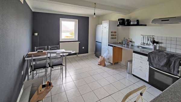 3051035e Wohnung links - Zweifamilienhaus in 35108 Allendorf mit 142m² als Kapitalanlage kaufen