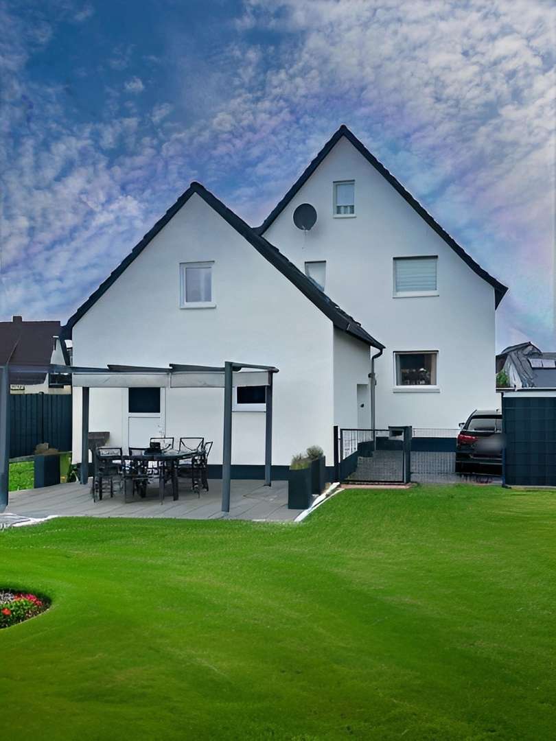Gartenansicht - Einfamilienhaus in 59590 Geseke mit 132m² kaufen