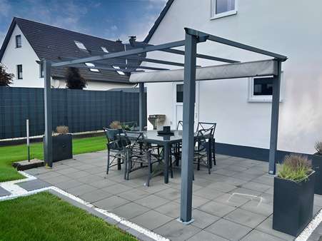 Terrasse mit Sonnendach - Einfamilienhaus in 59590 Geseke mit 132m² kaufen