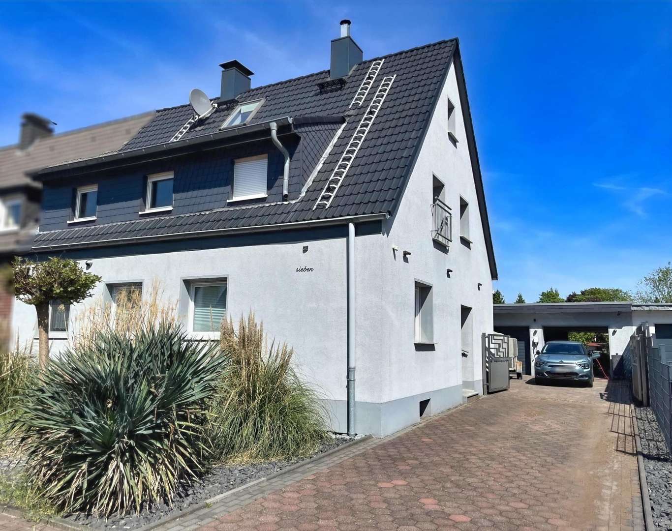 Die Straßenansicht - Doppelhaushälfte in 45663 Recklinghausen mit 120m² kaufen