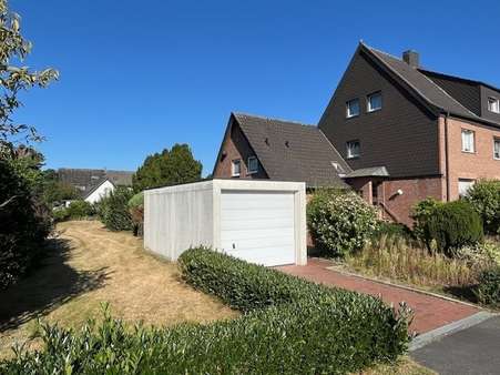 Ansicht mit Garage - Doppelhaushälfte in 46282 Dorsten mit 124m² kaufen
