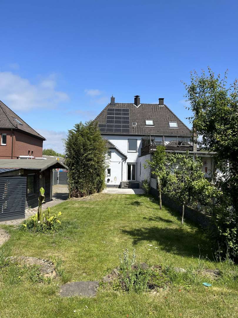 Hinten - Doppelhaushälfte in 45739 Oer-Erkenschwick mit 113m² kaufen
