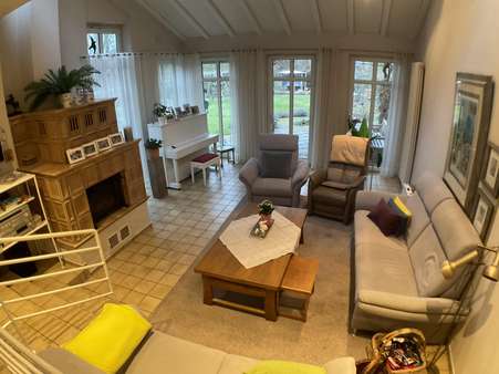 Wohnzimmer mit Kamin - Zweifamilienhaus in 59399 Olfen mit 219m² kaufen
