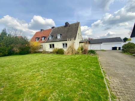 Hausfront - Doppelhaushälfte in 44287 Dortmund mit 110m² kaufen