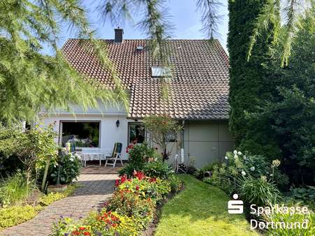 Gartenansicht - Einfamilienhaus in 44267 Dortmund mit 148m² kaufen