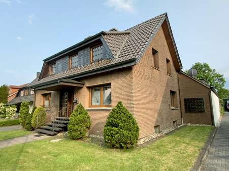 seitliche Hausansicht seitliche Hausansicht - Einfamilienhaus in 59368 Werne mit 130m² kaufen