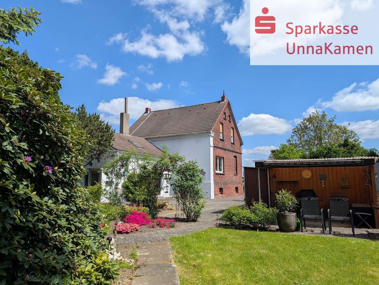 Gartenansicht - Zweifamilienhaus in 59425 Unna mit 127m² kaufen