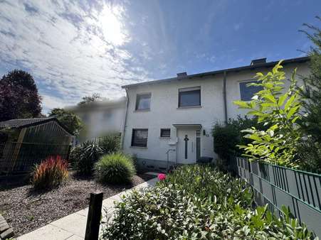 Außenansicht Außenansicht - Reihenmittelhaus in 59427 Unna mit 108m² kaufen