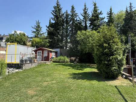 Garten mit einer Terrasse und Gartenhaus Garten mit einer Terrasse und Gartenhaus - Einfamilienhaus in 58119 Hagen mit 130m² kaufen