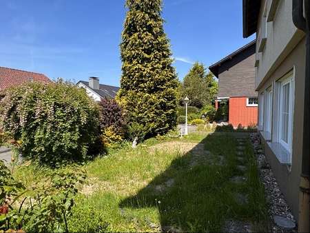 Garten vor dem Haus Bild 1 - Einfamilienhaus in 58091 Hagen mit 145m² kaufen