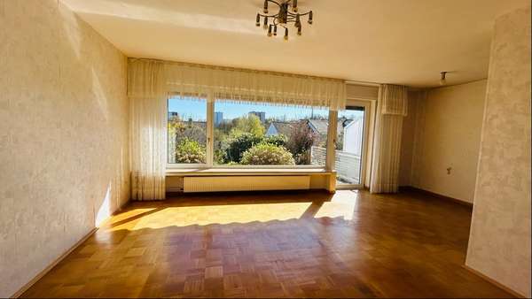 Wohnzimmer mit Terrassenblick - Reihenmittelhaus in 58507 Lüdenscheid mit 106m² kaufen