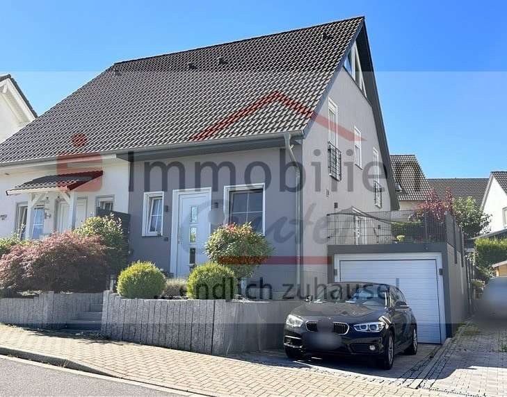 Seitenansicht - Doppelhaushälfte in 58119 Hagen mit 90m² kaufen