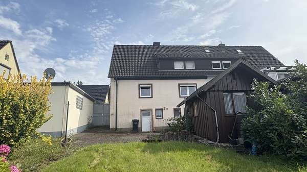 Hausrückseite Hausrückseite - Doppelhaushälfte in 58809 Neuenrade mit 91m² kaufen