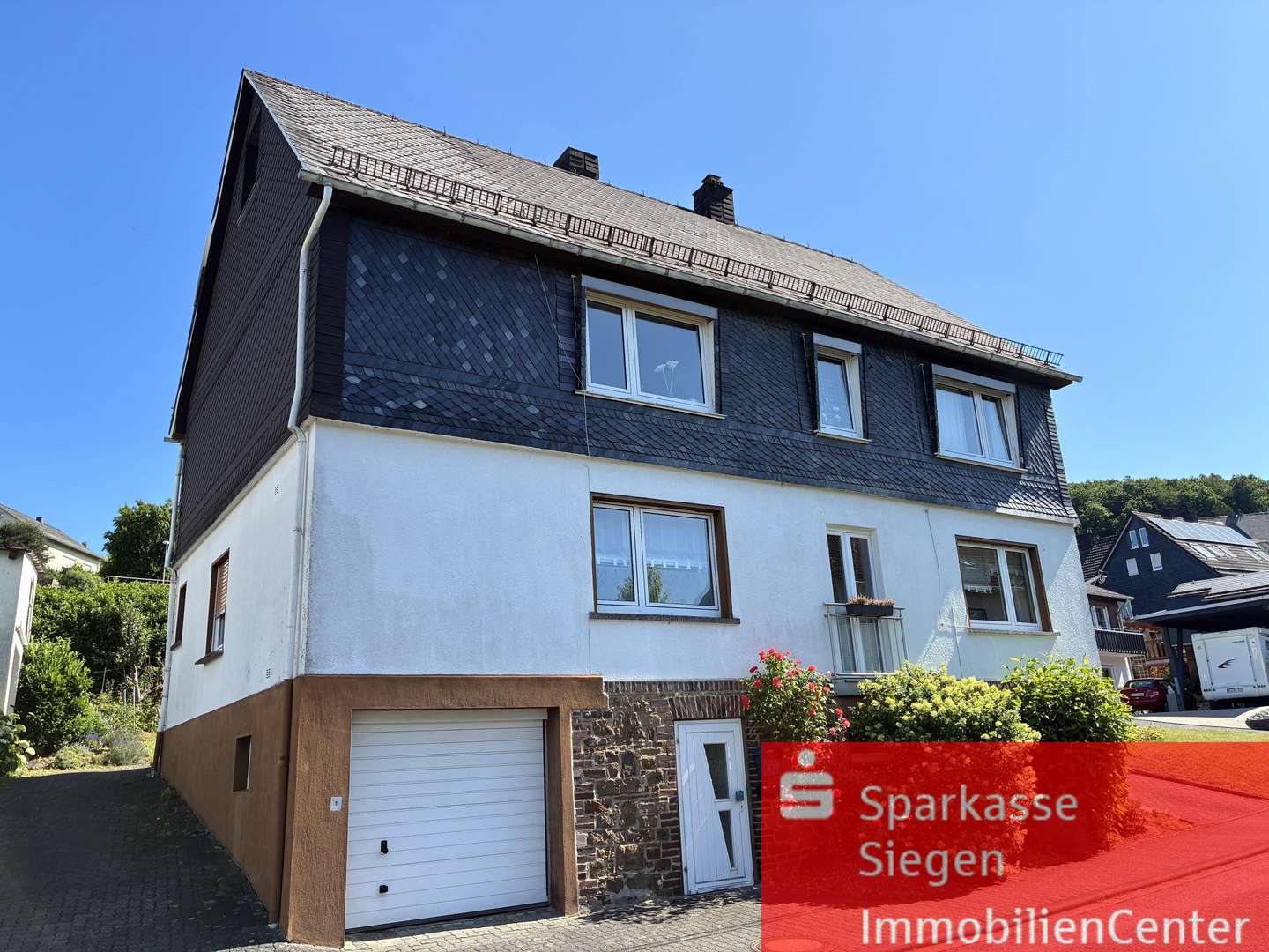 Straßenansicht - Einfamilienhaus in 57250 Netphen mit 150m² kaufen